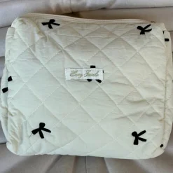 Put a Bow on It Toiletry Bag^Evry Jewels Online